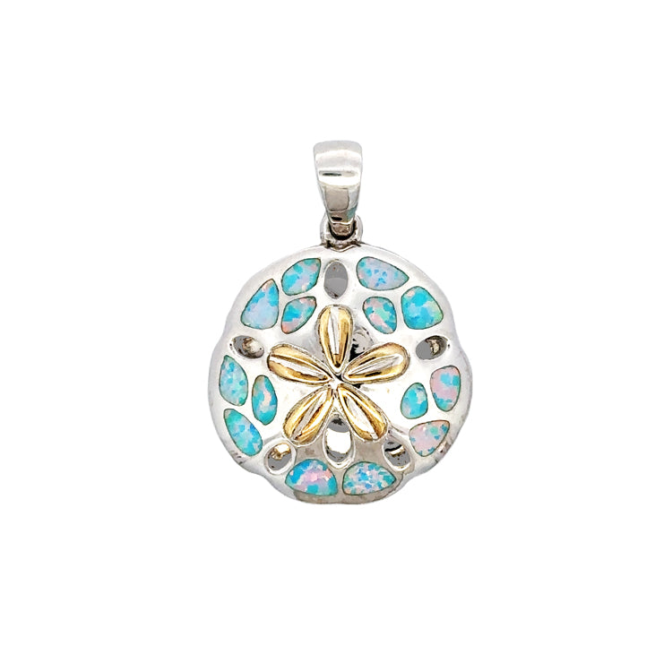   Capture the beauty of the sea with this 3-D Sand Dollar Pendant by Kovel! Crafted with 925 Rhodium Silver and delicate 18Kt Gold Accent Plating, this pendant is adorned with stunning Lab Created Pink and Blue Opal. At 1-3/16" drop and 1-7/8" wide, this exquisite pendant is perfect to express your style