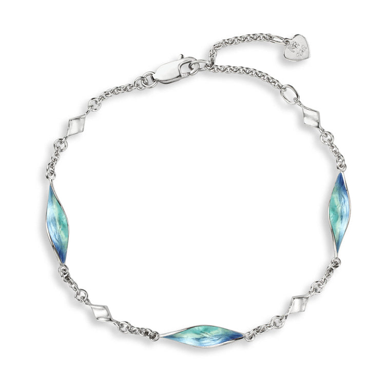 Blue Ocean Aurora Double-Sided-Twist Station Bracelet in Sterling Silver with Vitreous Enamel by Nicole Barr Jewelry. Rhodium Plated for easy care.  Dimensions; 7.5"-8.25" long
