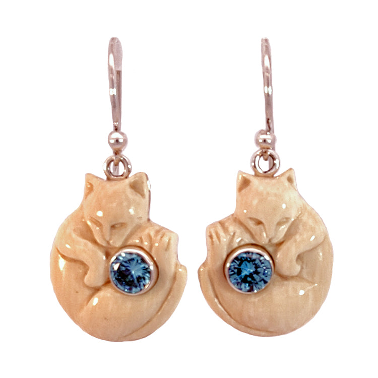 &quot;Cozy Cat&quot; Fossilized Mammoth Ivory and Blue Topaz Sterling Silver Earrings by Zealandia. Due to the Natural color variation of Fossil material, Ivory color can vary and may be somewhat darker or lighter than pictured.  Dimensions:  7/8&quot; Long, 1/2&quot; Wide, 1-1/4&quot; Drop
