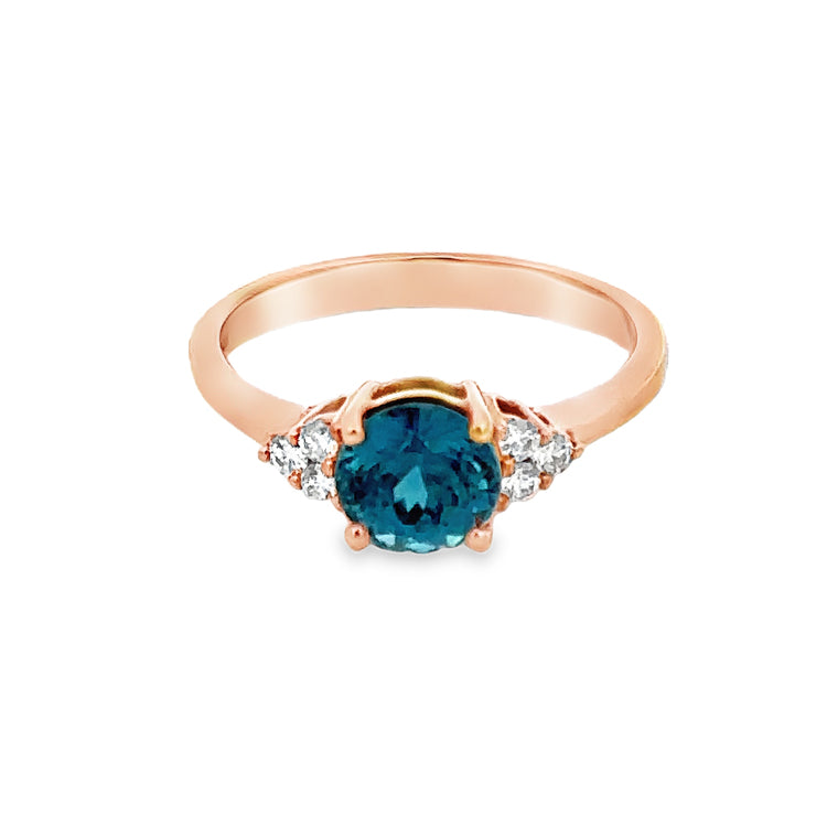 14Kt Pink Gold Ring set with 1.83ct Blue Zircon and .12tw Diamonds  Dimensions; 6.35mm X 12.81mm top, 2.5mm shank