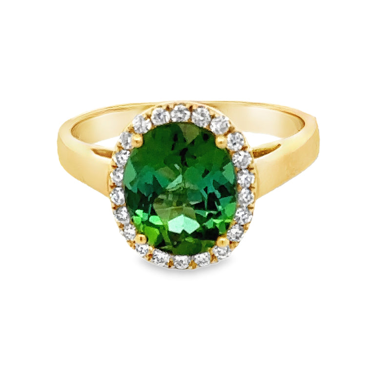 18Kt Yellow Gold Ring with 2.30Ct Oval Green Tourmaline in a halo of .20TW of G-H SI1-SI2 Diamonds.