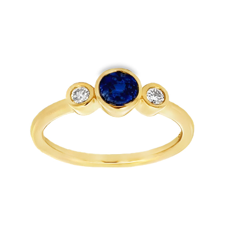 14Kt Yellow Gold Bezel-set, 3 Stone Ring with .48Ct Round Blue Sapphire Center stone and .10tw Diamond side stones. Stock size 6.25 can be sized to order.  Dimensions;&amp;nbsp; 5.42mm diameter top, 1.8mm shank, 4.11mm high from top of finger.