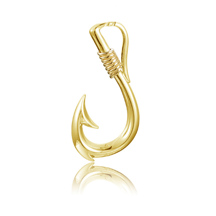 Gold fish hook pendant on a white background