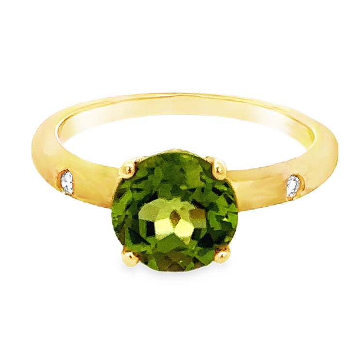 14Kt Yellow Gold ring with a prong set 2.48ct round Peridot and 2 flush set diamonds totaling .03ct in a sand blasted tapered shank.  Dimensions: 8mm center on 2.3mm-2mm tapered shank. center sits 5.5mm above finger. Stock size 6.5 can br sized.