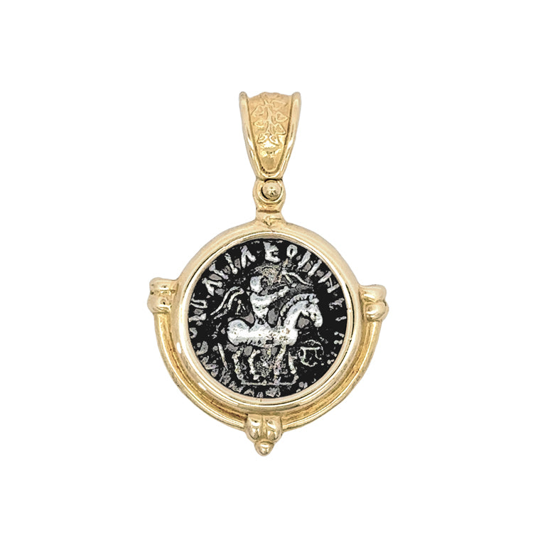 Ancient Silver Indo-Scythian Drachm attributed to King Azes II of Bactria in 14Kt Yellow Gold Pendant. Obverse: King holding whip; mounted on horse walking right. Monogram is written to right to under horse. Written is a corrupt Greek legend