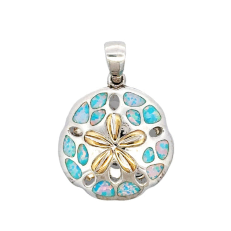   Capture the beauty of the sea with this 3-D Sand Dollar Pendant by Kovel! Crafted with 925 Rhodium Silver and delicate 18Kt Gold Accent Plating, this pendant is adorned with stunning Lab Created Pink and Blue Opal. At 1-3/16" drop and 1-7/8" wide, this exquisite pendant is perfect to express your style