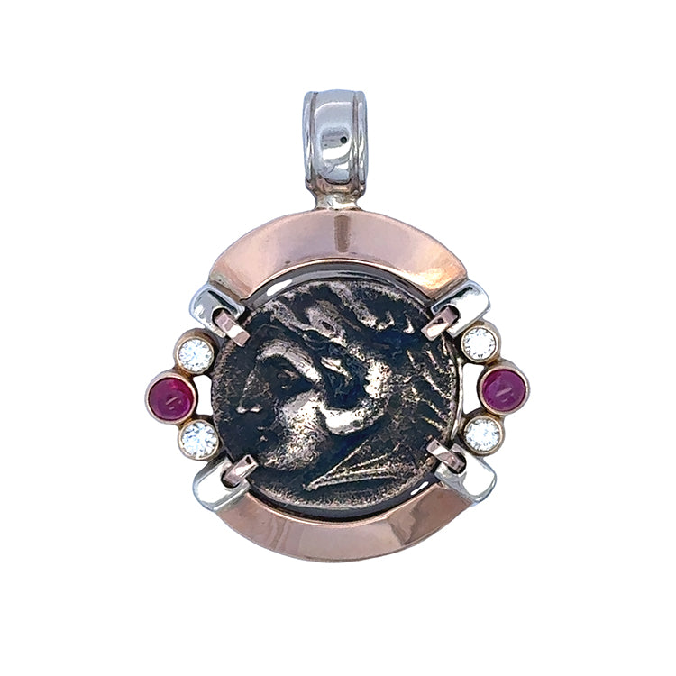 Ancient Greek AE16 Bronze Coin Pendant Circa 336 - 306 B.C.  Obverse: Head of Herakles wearing lion skin headdress.