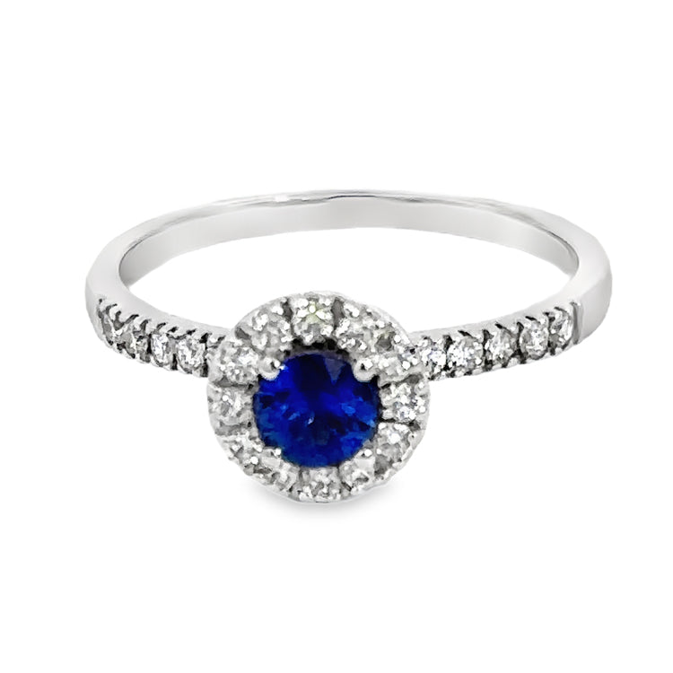 14Kt White Gold Ring with .37Ct Round Blue Sapphire in a Diamond halo on a diamond accented band. totla diamond weight is .29tw. Stock size 7 can be sized to order.  Dimensions;&amp;nbsp; 9mm diameter top, 1.8mm shank, 6.57mm high from top of finger.