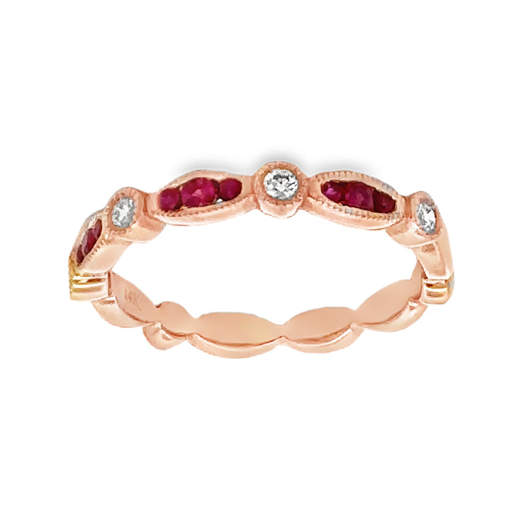 14Kt pink gold, stackable band style ring with alternating navette and round sections that are accented with milgrain detail. The three center navette shapes are set with .16tw Round Rubies alternating with four round sections set with .10tw Round Diamonds. Stock size 6.5 can be sized to order.