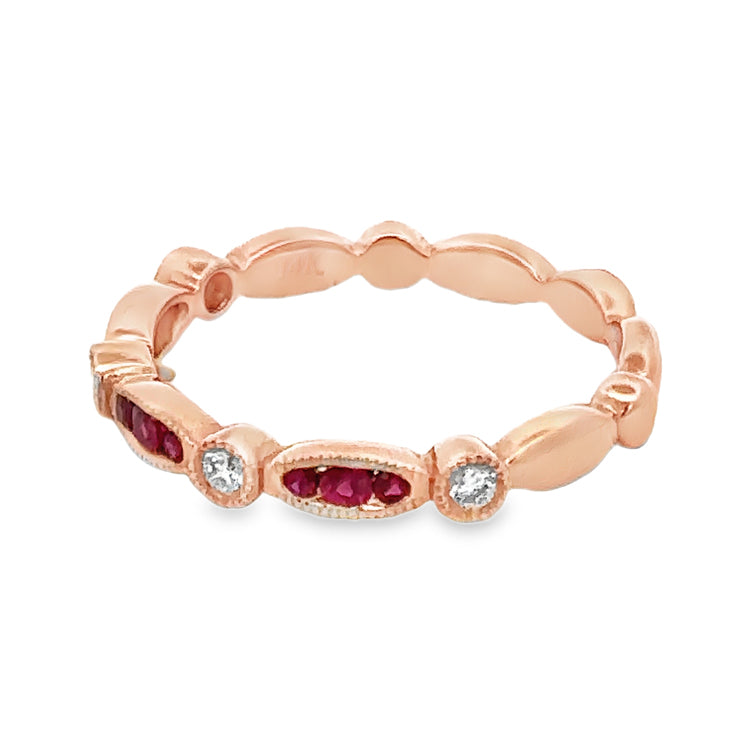 14Kt pink gold, stackable band style ring with alternating navette and round sections that are accented with milgrain detail. The three center navette shapes are set with .16tw Round Rubies alternating with four round sections set with .10tw Round Diamonds. Stock size 6.5 can be sized to order.