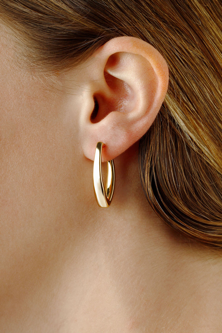 14kt Yellow Gold Tapered 1&quot; &quot;V&quot; Hoop Earrings with Snap Down Posts on Model.