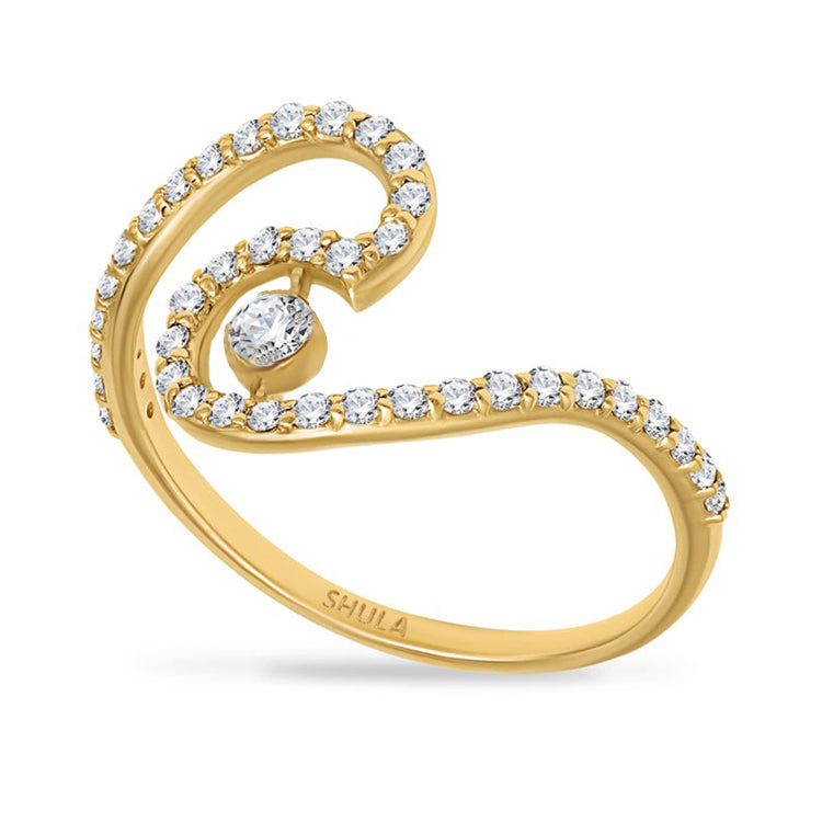 Gold ring with diamond accents on a white background