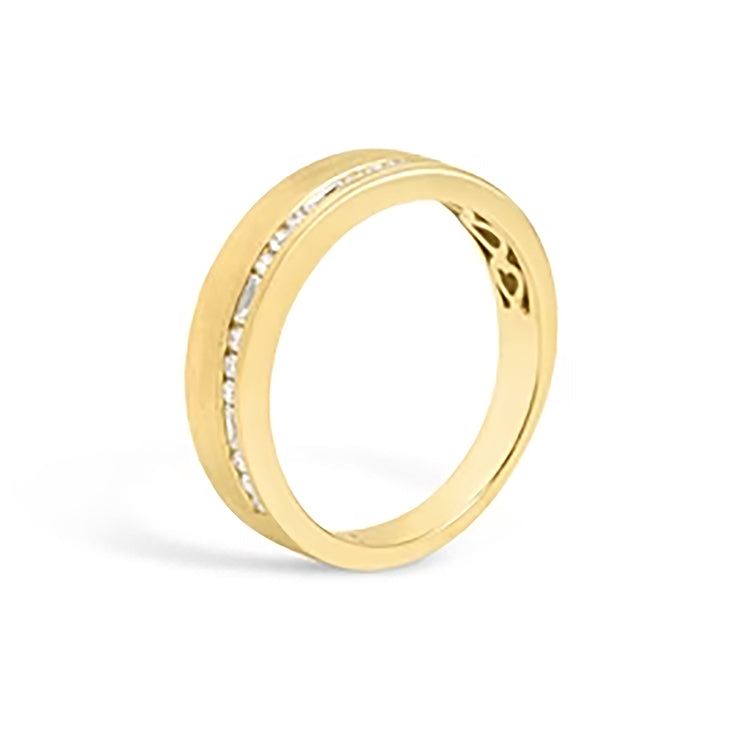 Gold ring with channel set round and baguette diamonds.