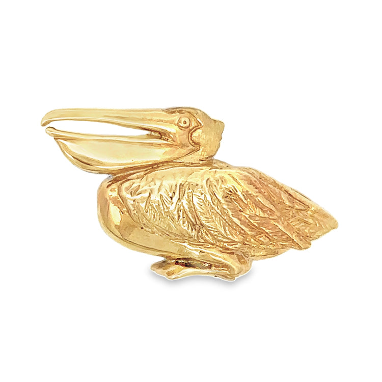 14Kt Yellow Gold "Squatty" Pelican Pendant. An original Cedar Chest Design.  Dimensions; 3/4" tall x 1-3/8" wide, with hidden bail behind head.
