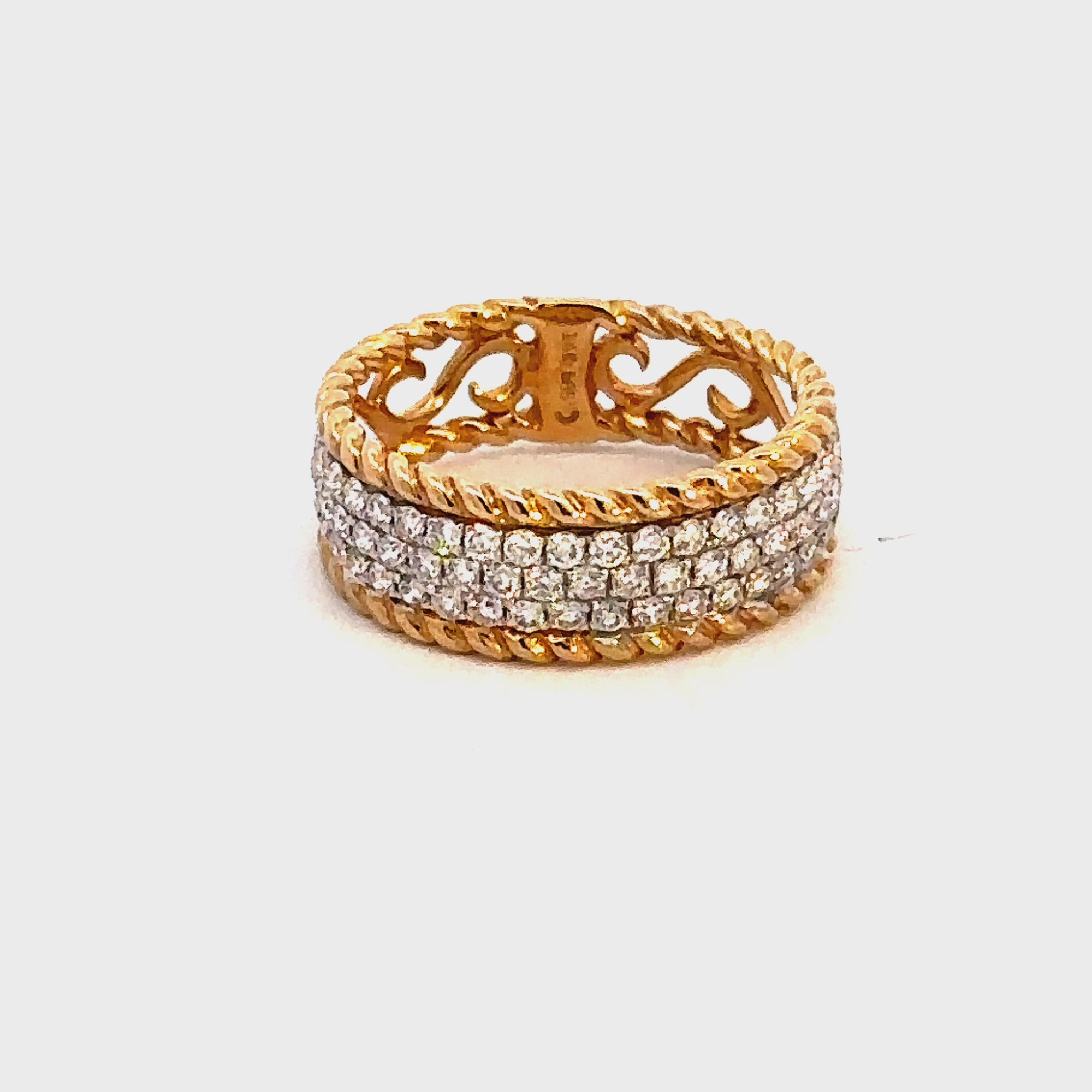 video of 14KT Yellow Gold Rope Edge Pave' Band with .75TW Diamonds Highlighted with Rhodium.   Stock Size 6.5.