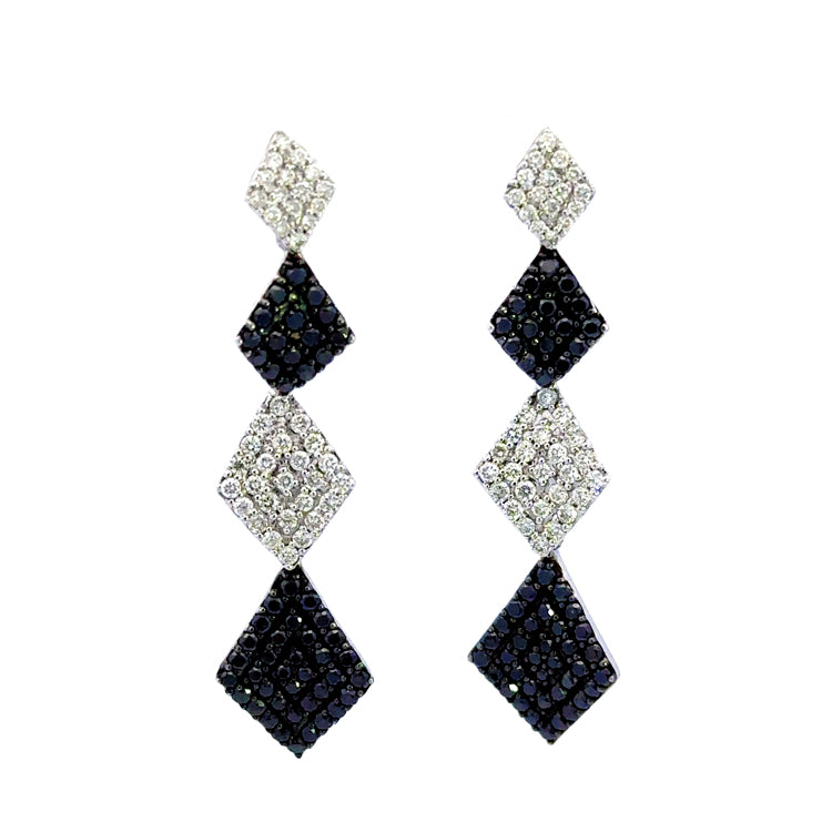 14Kt White Gold Diamond Dangle Earrings with 1.55TW White and Black Diamonds.     Dimensions1-1/2" long, 3/8" at widest