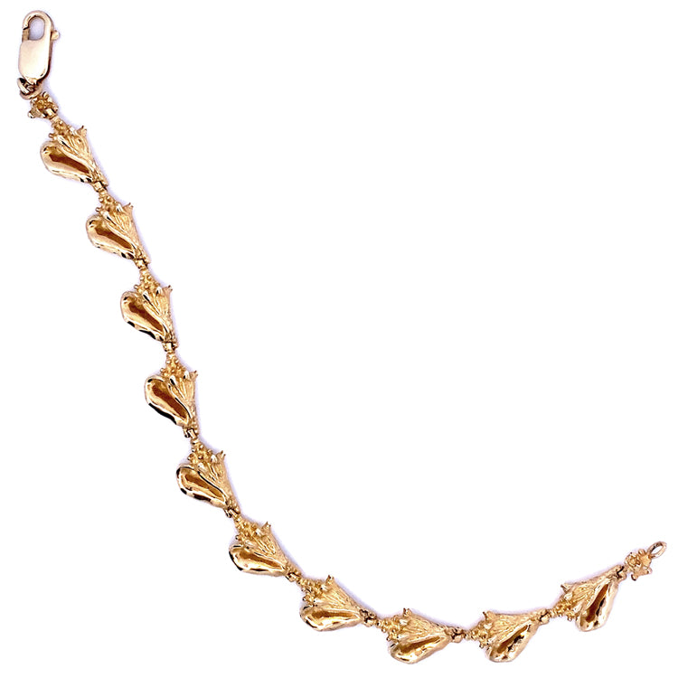 14Kt Yellow Gold Conch Shells Bracelet.  7.25" long with Lobster claw clasp