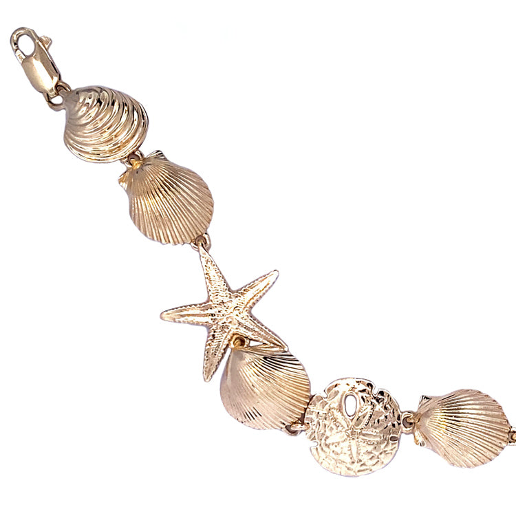 14Kt Yellow Gold Large Seashell Bracelet Featuring Starfish, Scallops, Sand Dollars, and Clams.  7.25" long with Lobster claw clasp