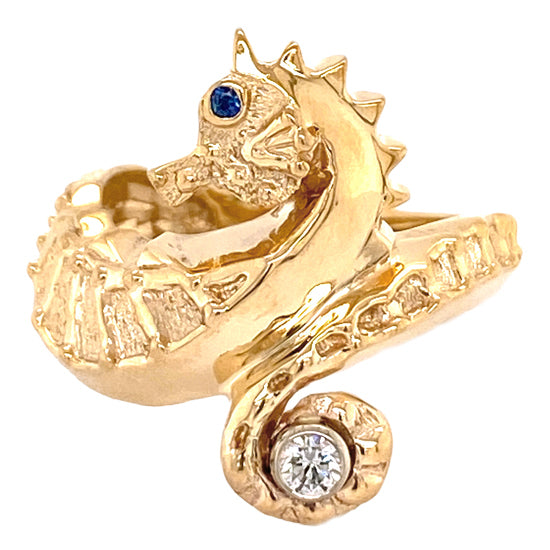 14Kt Yellow Gold Seahorse Ring with .10CT Diamond in the Tail and Sapphire in the Eye. An Original Cedar Chest Design.